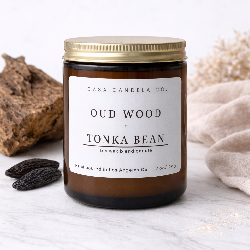 Oud Wood and Tonka Bean soy candle in amber glass jar - Casa Candela Co