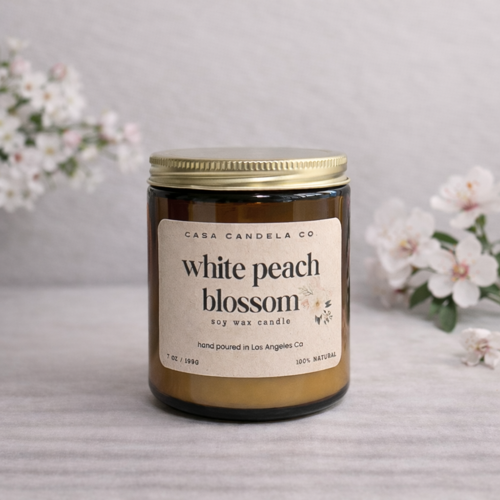 White Peach Blossom soy candle in amber glass jar - Casa Candela Co
